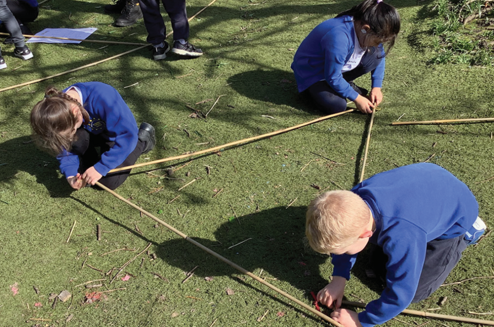 School children making a den
